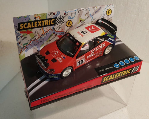 coche Scalextric Citroën Xsara WRC Carlos Sainz Marc y Martí Rally Montecarlo 2003 escala 1:32  TecniToys 6122 con luces