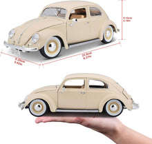 Carregar imagem no visualizador da galeria,  Volkswagen Käfer-Beetle (1955) 1/18 Una magnífica reproducción metálica a escala 1/18 Se abren puertas, capot y maletero. La dirección del vehiculo es practicable. Ideal para coleccionistas.