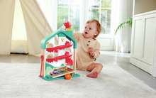 Carregar imagem no visualizador da galeria, Mansión Melódica con Bolas - Hape Experimenta la alegría de la música y la diversión de rodar con nuestro juego de bola descendente por una forma de casa. Navega por el laberinto colorido o extrae el xilófono para tocar melodías. Los niños deberán utilizar el martillito para introducir las bolas en la mansión e iniciar su descenso trepidante y sonoro. 