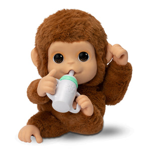 ¡Little Live Pet  Lil Baby Monkey!  aspecto y tacto realista de un bebé mono, también actúa como tal y tiene manos y pies que pueden agarrar, agarrar y abrazarse a objetos. Lil Baby Monkey también su boca es móvil y llama, habla y permite darle de comer. Con más de 50 sonidos y reacciones