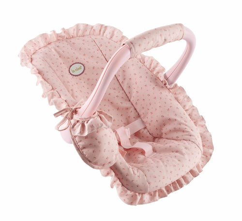  Maxi Cosi con asa reclinable en diferentes posiciones. Incluye babero a conjunto. Con una bonita tela de estampado floreado rosa.  El muñeco que puede ponerse en el capazo puede medir entre 30 y 52 cm.  