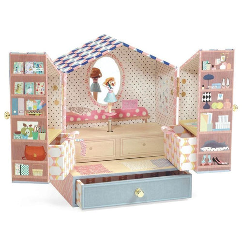 Joyero  Musical Tinou Shop es una caja de música bellamente ilustrada con tres cajones para guardar joyas y secretos. Tiene un cajoncito grande frontal y 2 cajoncitos laterales en las puertas.