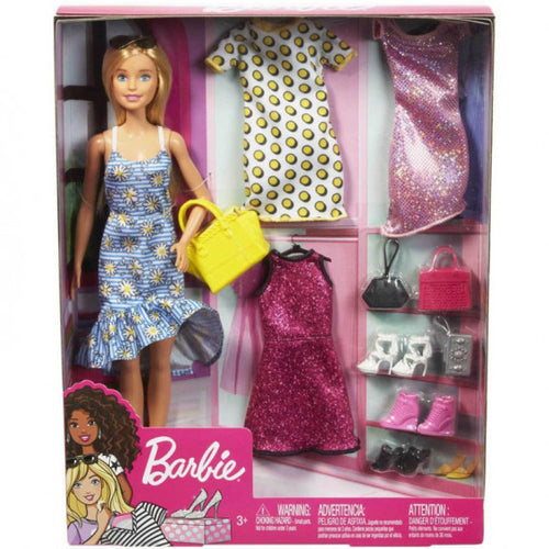 Barbie con vestidos le encanta la moda. Además de lo puesto incluye 3 vestidos para cambiar, 3 pares de zapatos, bolsos y complementos