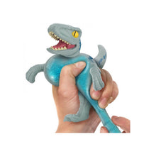 Carregar imagem no visualizador da galeria, Heroes of Goo Jit Zu te trae los nuevos héroes elásticos del mundo Jurásico. Realista y muy elástico. El velociraptor se estira hasta 3 veces su tamaño Agarra y estira los brazos y las piernas de Blue. 