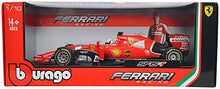 Cargar imagen en el visor de la galería,  Ferrari de F1 SF15T hecho a escala 1/18. Este coche fue conducido por Sebastian Vettel en la temporada 2015. La caja viene con la imagen y firmada por el piloto alemán.Coleccionismo.
