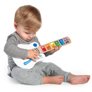 Guitarra Magic Touch - Hape , Esta guitarra de madera Baby Einstein es táctil y cada animalito corresponde a una nota diferente.